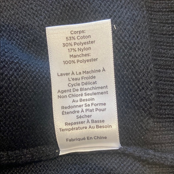 Chic Black Sweater with Sheer Polka Dot Sleeves - Picture 6 of 7